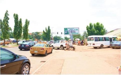 Along Yakubu Gowon Way by AYA Traffic, Abuja — light box wall drape static billboard site
